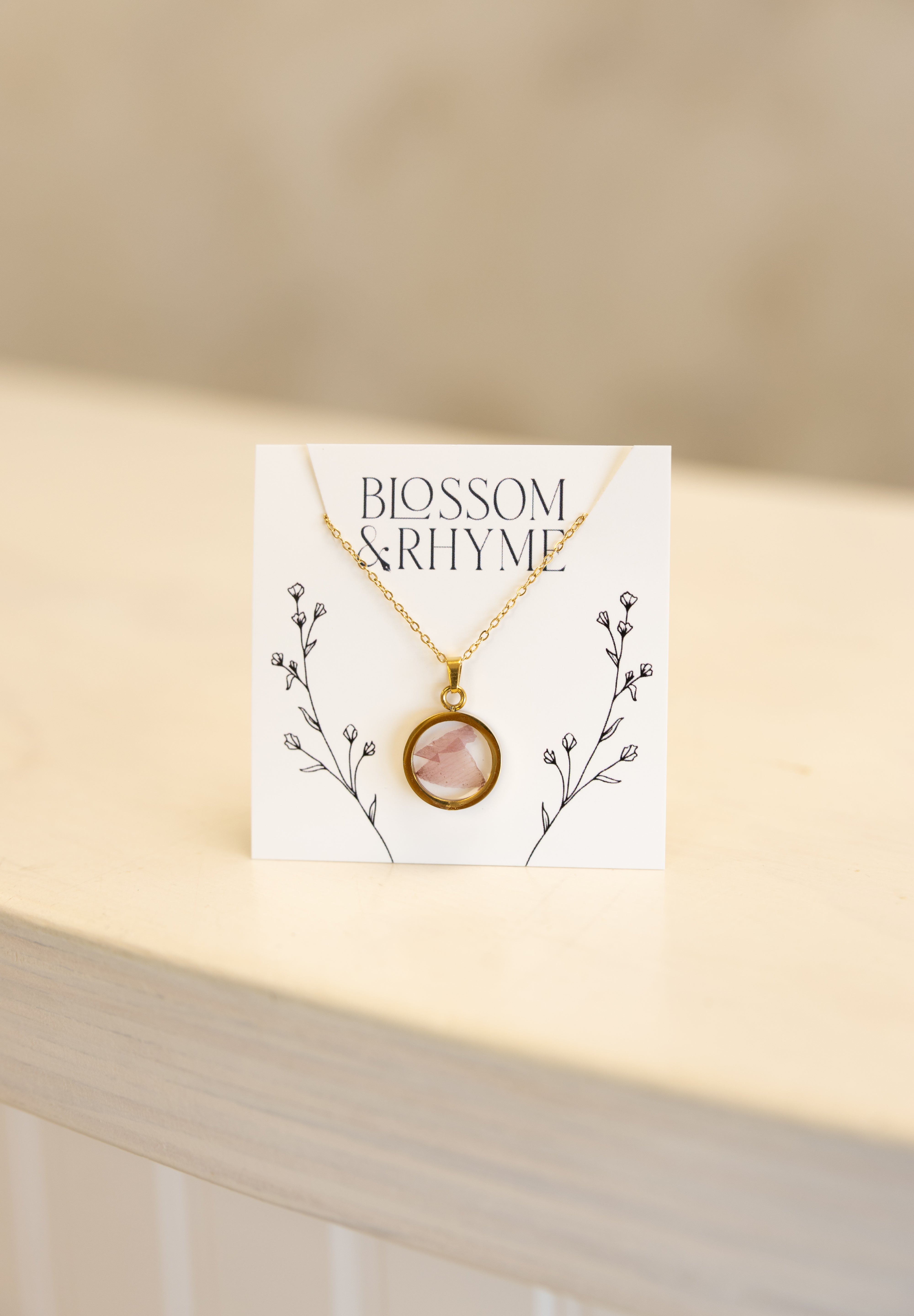 August birth month flower - poppy pressed into a pendant necklace keepsake.