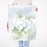 Still-life painting of simple bridal bouquet, white, green, and blue floral features.