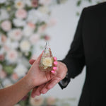 Custom-made ring holder from preserved wedding flowers.
