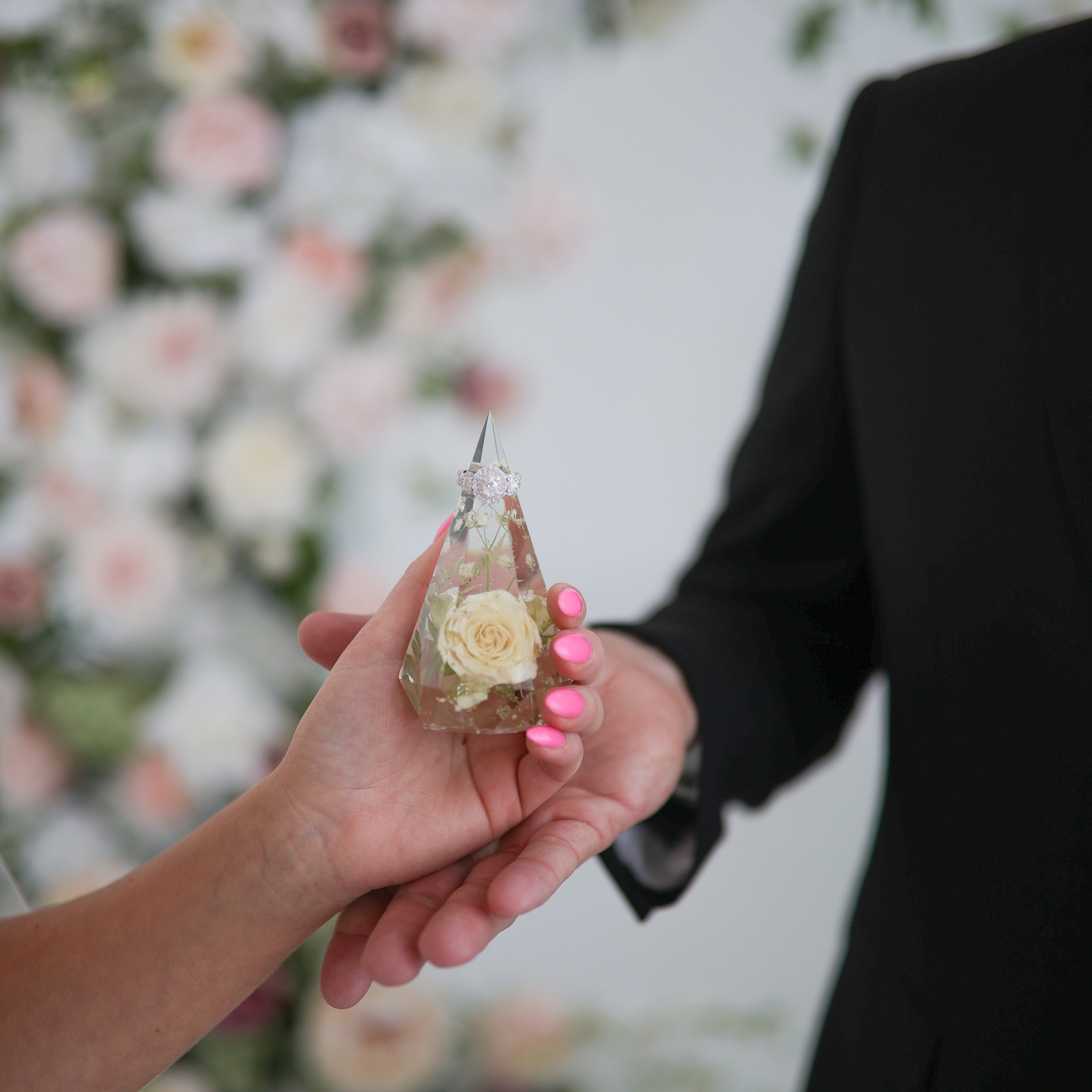 Custom-made ring holder from preserved wedding flowers.