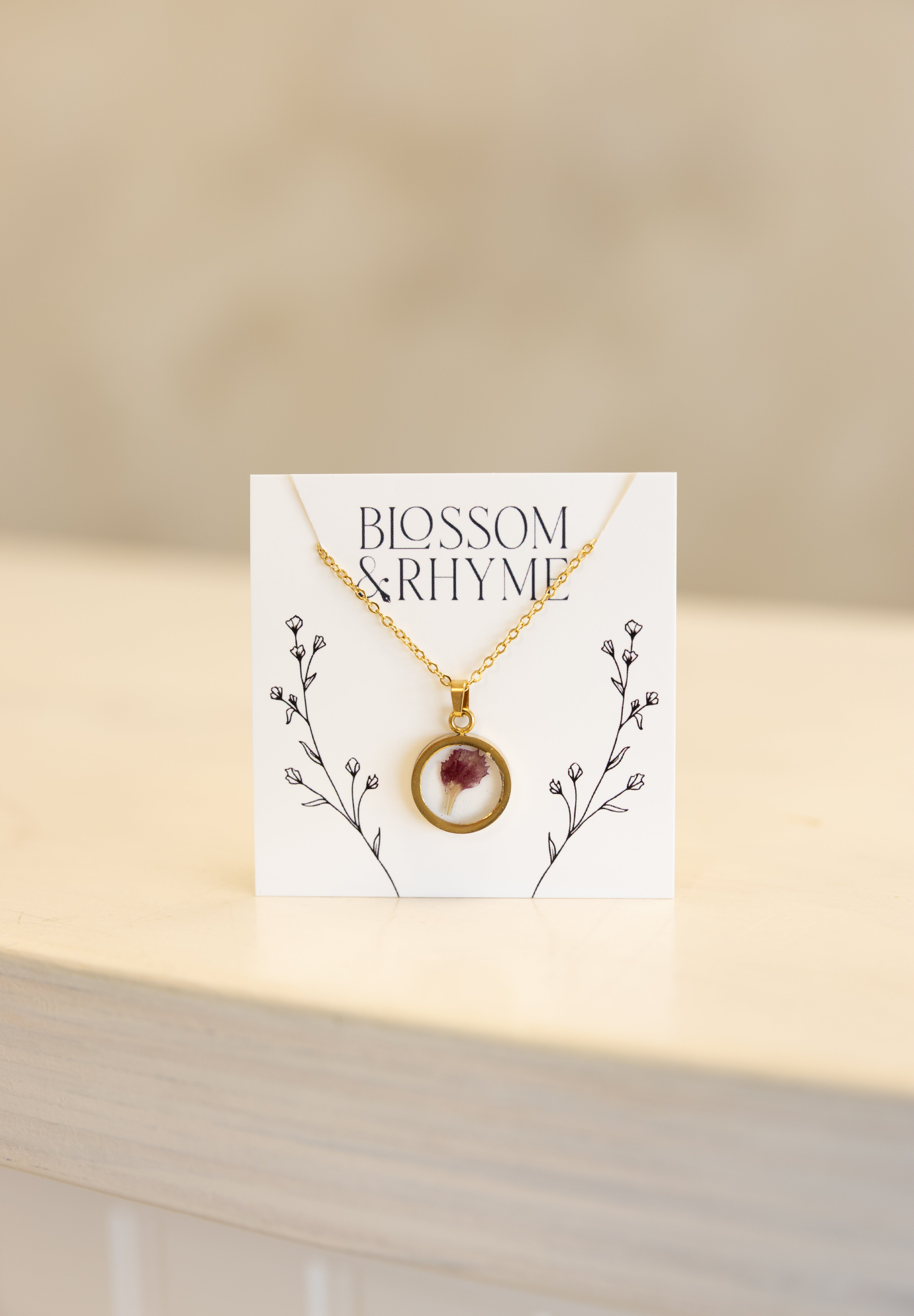 January birth month flower - carnation pressed into a pendant necklace keepsake.