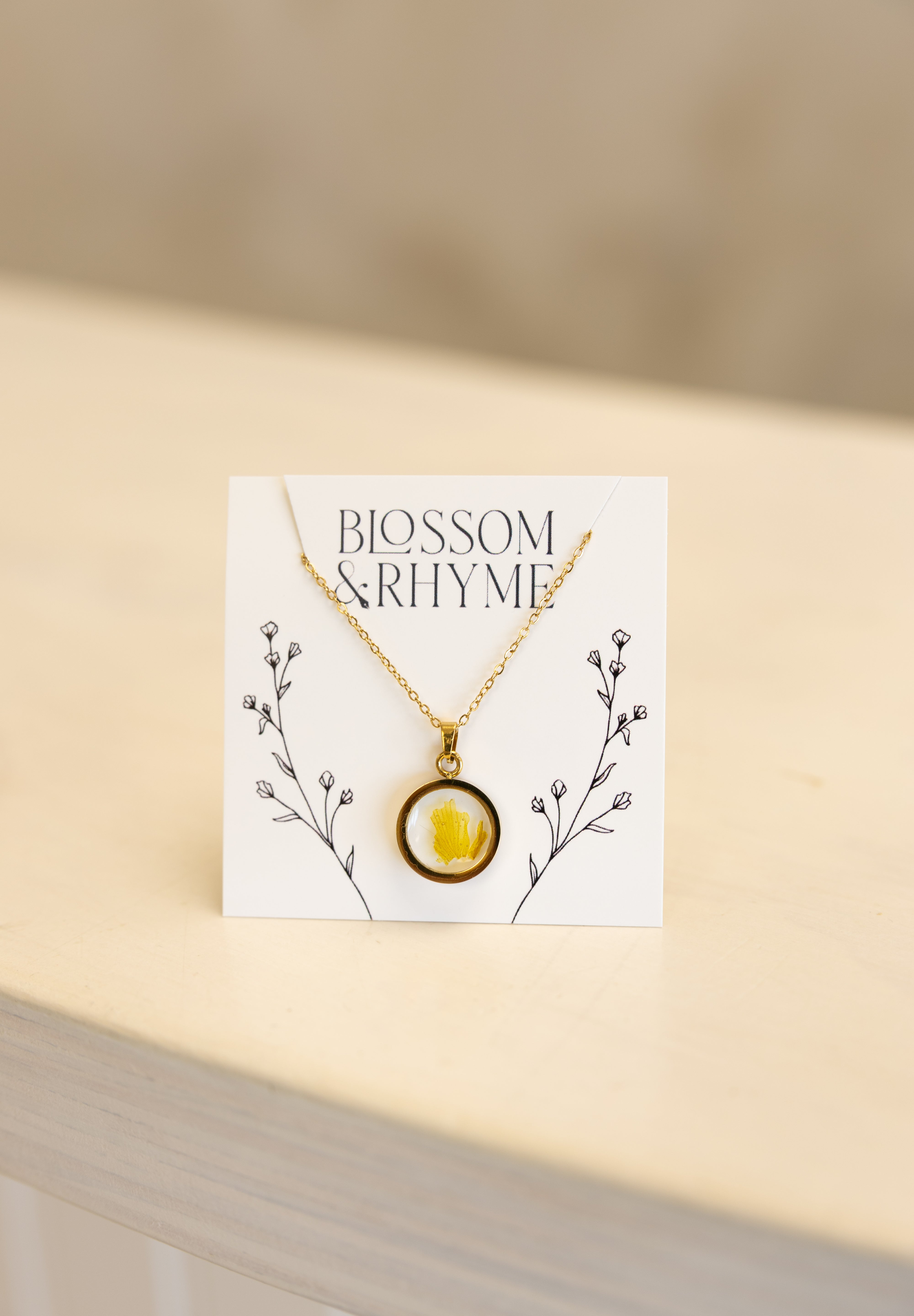 March birth month flower - daffodil pressed into a pendant necklace keepsake.