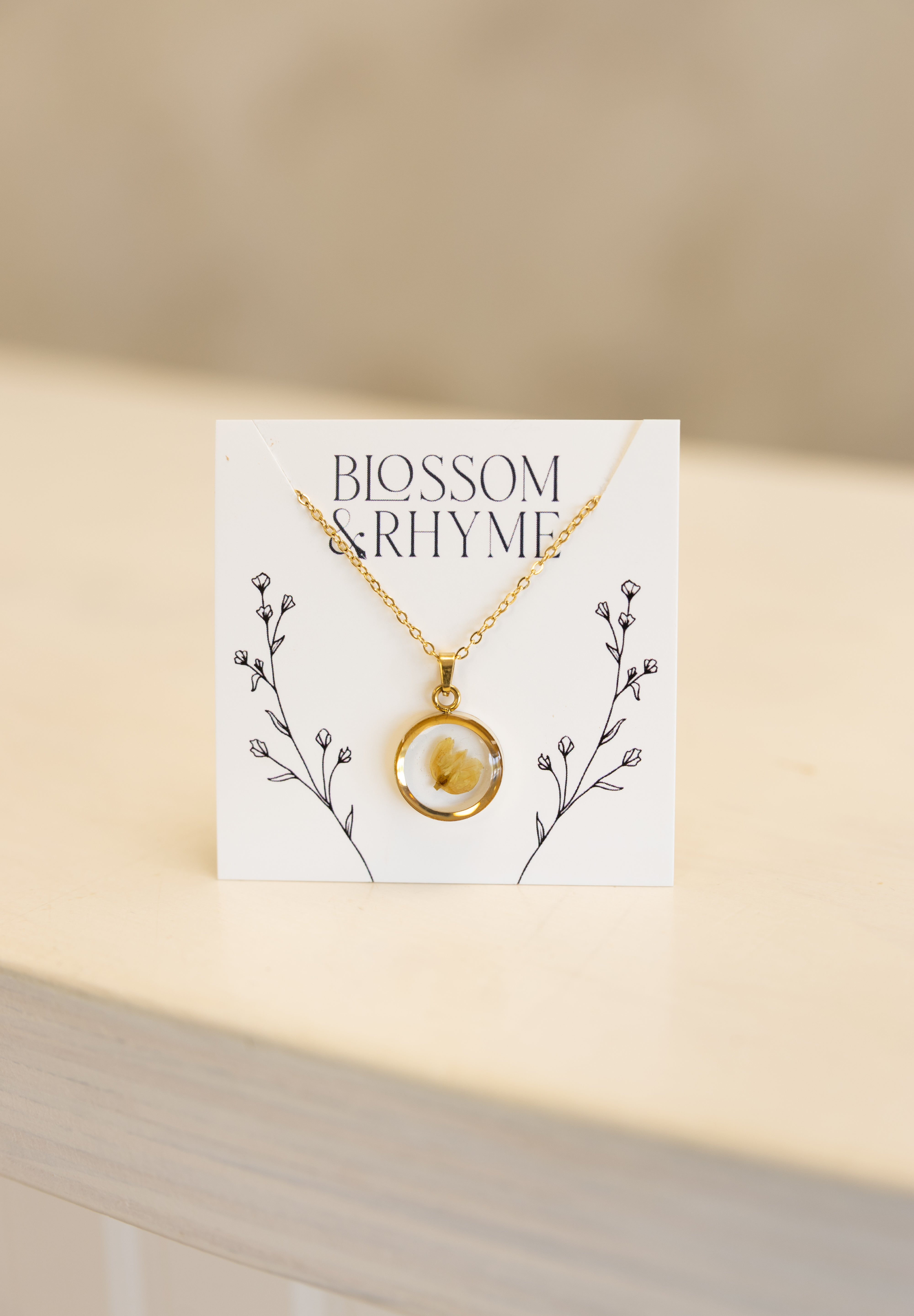 May birth month flower - lily of the valley pressed into a pendant necklace keepsake.