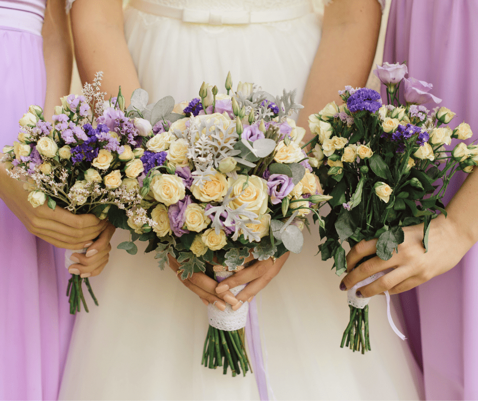 Bride planning wedding flowers with a florist while selecting a bridal bouquet for professional flower preservation.