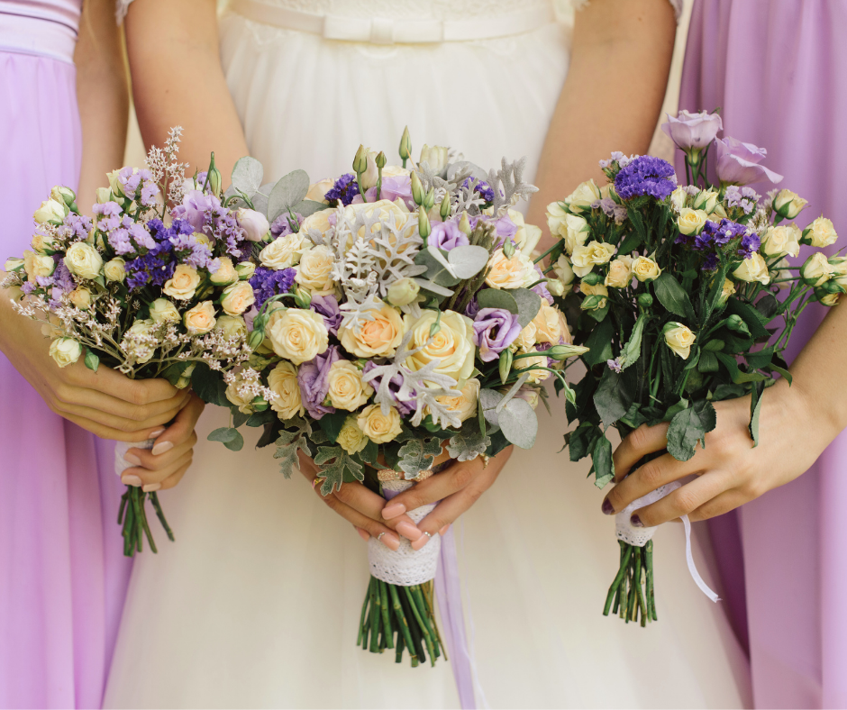 Bride planning wedding flowers with a florist while selecting a bridal bouquet for professional flower preservation.