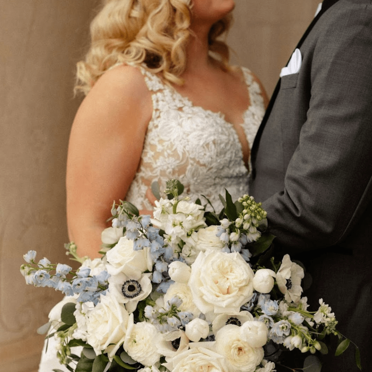 Wedding day emergency kit with bridal beauty essentials, dress repair supplies, and wedding bouquet ready for a stress-free wedding day and lasting floral preservation.