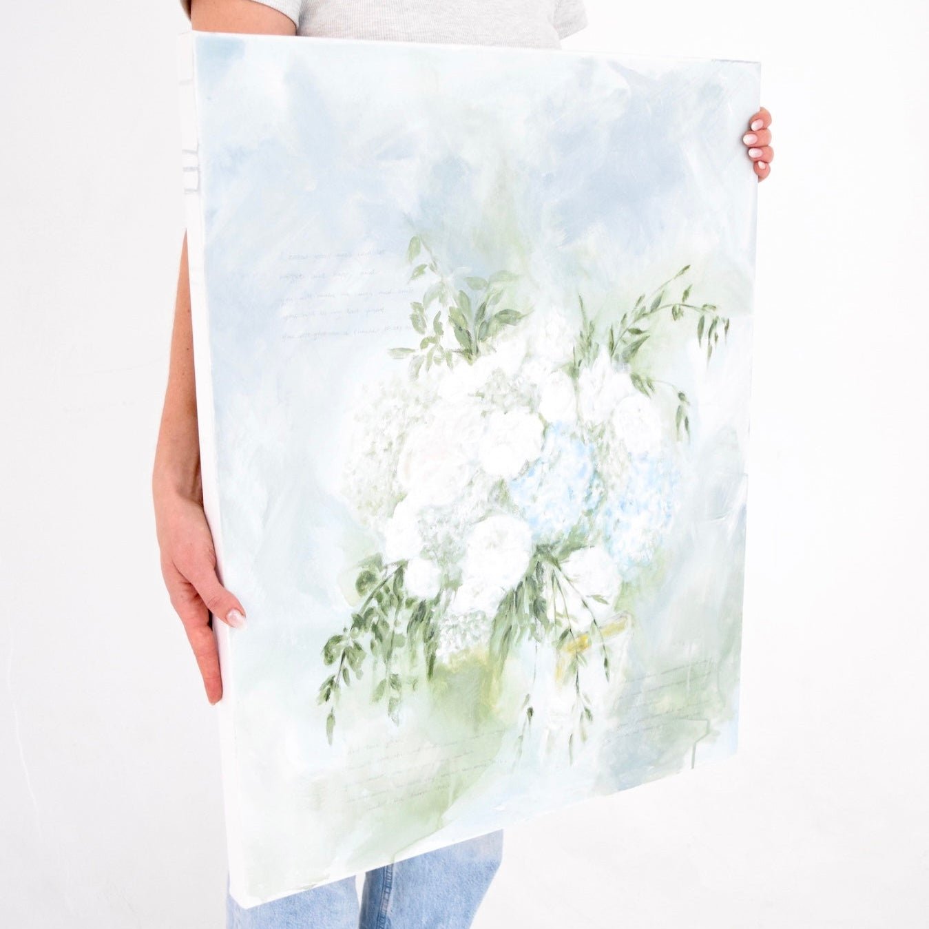 White flowers mixed with blue hydrangeas in bouquet painted as keepsake.