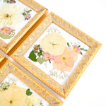 6x6 frame of pressed flowers from bridal bouquet.
