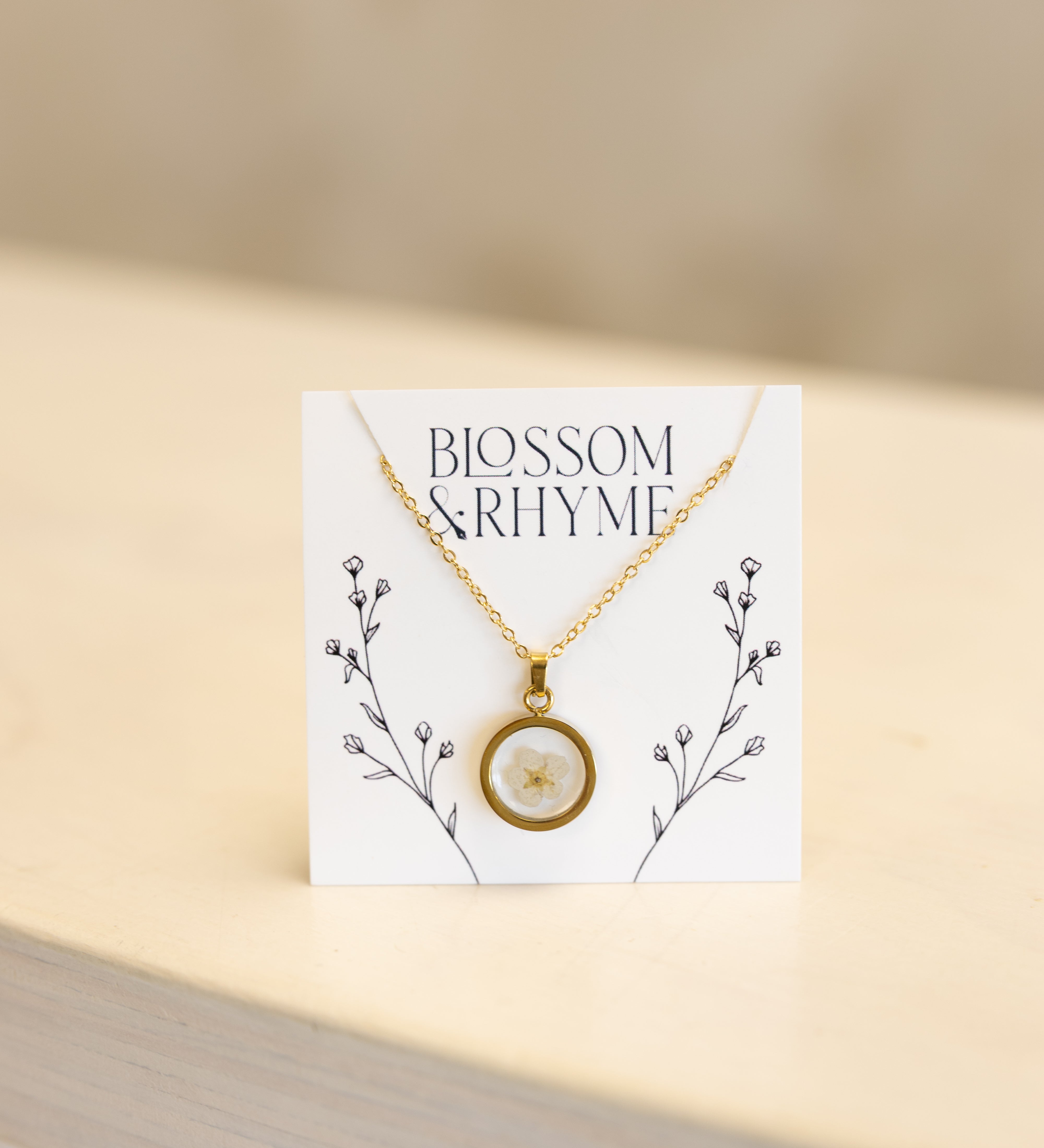 December birth month flower - narcissus pressed into a pendant necklace keepsake.