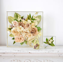 Wedding flower keepsake collection featuring a 12x12 resin floral block, faceted floral keepsake, and mini resin floral block preserving ivory roses, beige garden roses, hydrangeas, stock flowers, eucalyptus, and seasonal greenery, handcrafted by Blossom & Rhyme