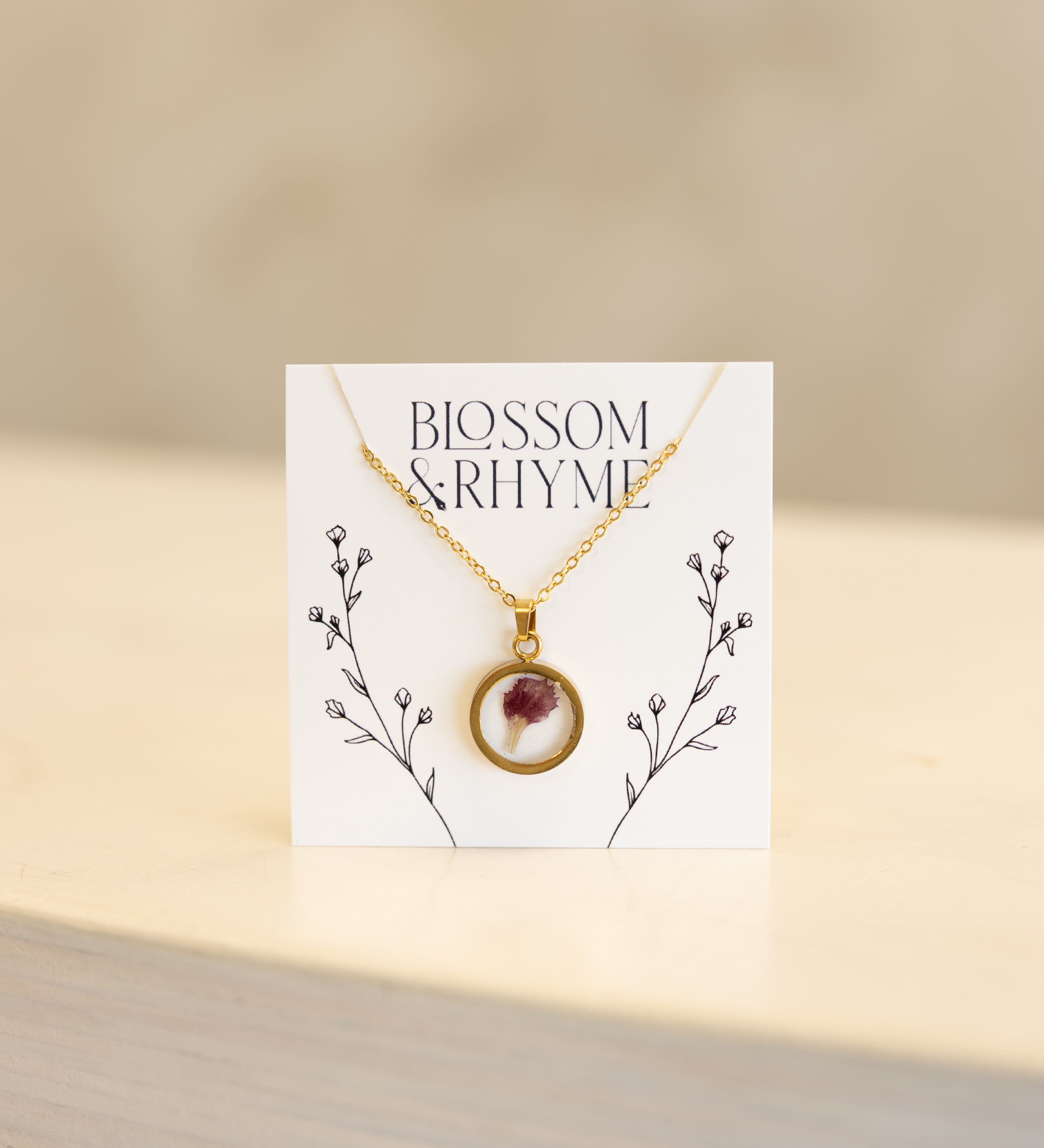 January birth month flower - carnation pressed into a pendant necklace keepsake.