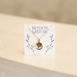 June birth month flower - rose pressed into a pendant necklace keepsake.