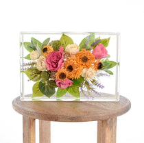Large floral rectangle preserving pink peonies, orange chrysanthemums, cream spray roses, green chrysanthemums, lavender sprigs, eucalyptus, and lush botanical greenery in clear resin, handcrafted by Blossom & Rhyme
