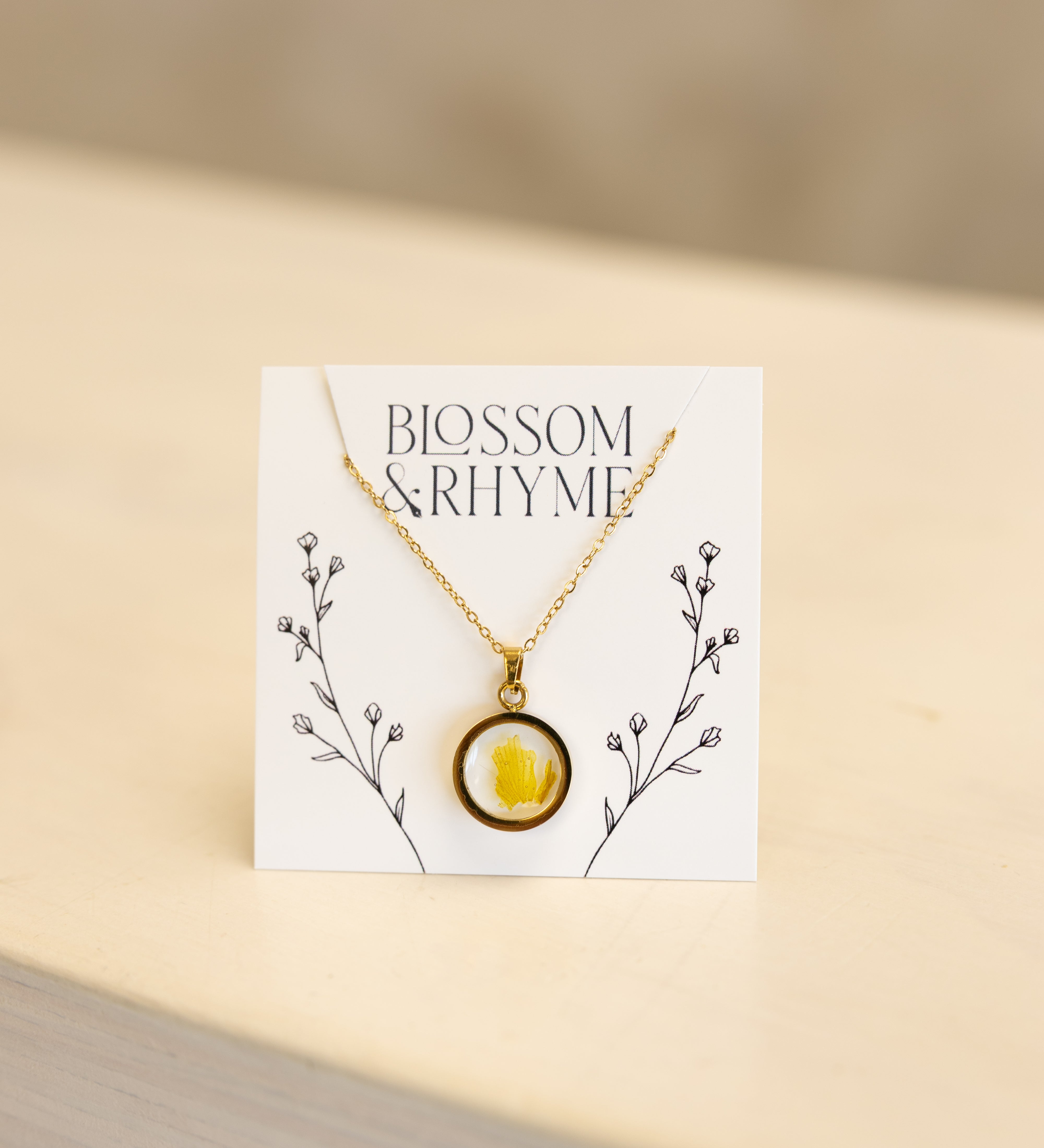 March birth month flower - daffodil pressed into a pendant necklace keepsake.