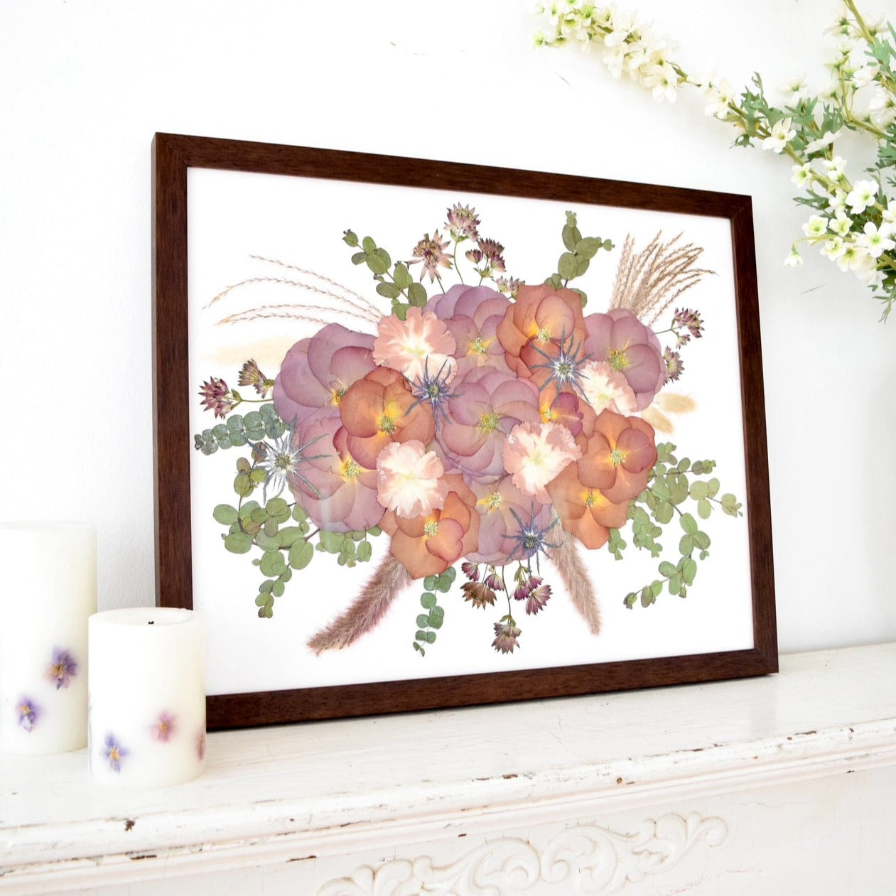 Pressed 16x20 floral  frame featuring preserved mauve cosmos, peach poppies, blue thistles, eucalyptus, bunny tail grass, seed pods, and botanical greenery in a walnut wood frame, handcrafted by Blossom & Rhyme
