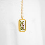 Simple preservation technique for wedding flowers florals in resin necklace.
