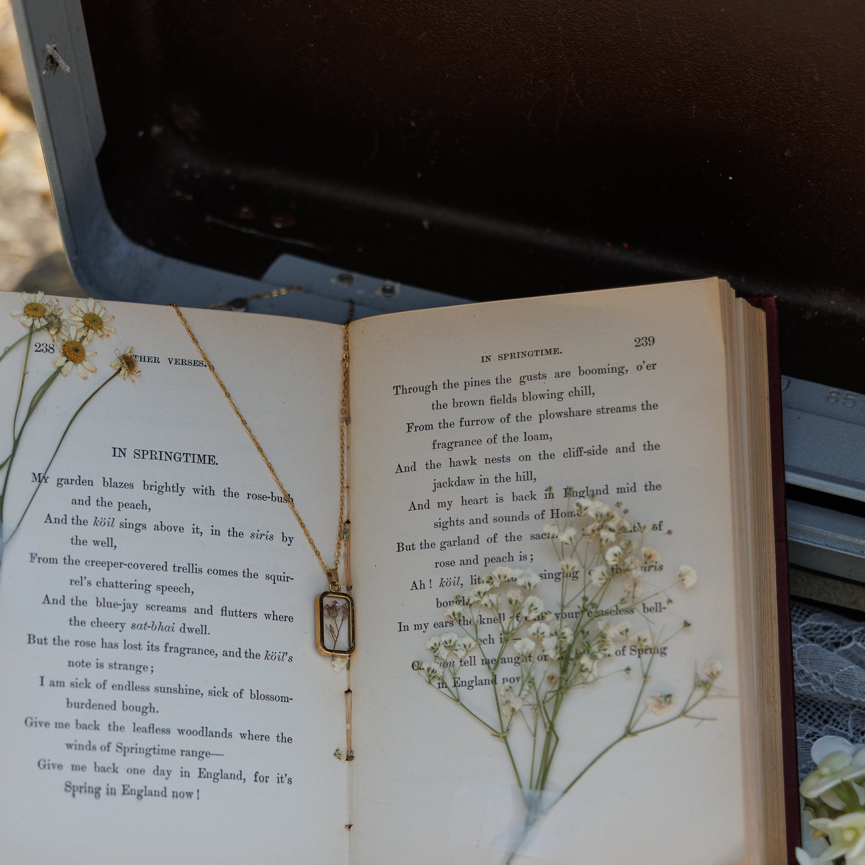 Custom floral necklace handcrafted with preserved wedding bouquet flowers, creating a personalized resin keepsake and timeless bridal heirloom.