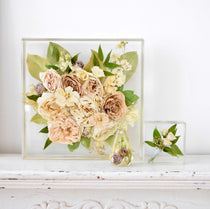 Wedding flower keepsake collection featuring a 12x12 resin floral block, faceted floral keepsake, and mini resin floral block preserving ivory roses, beige garden roses, hydrangeas, stock flowers, eucalyptus, and seasonal greenery, handcrafted by Blossom & Rhyme