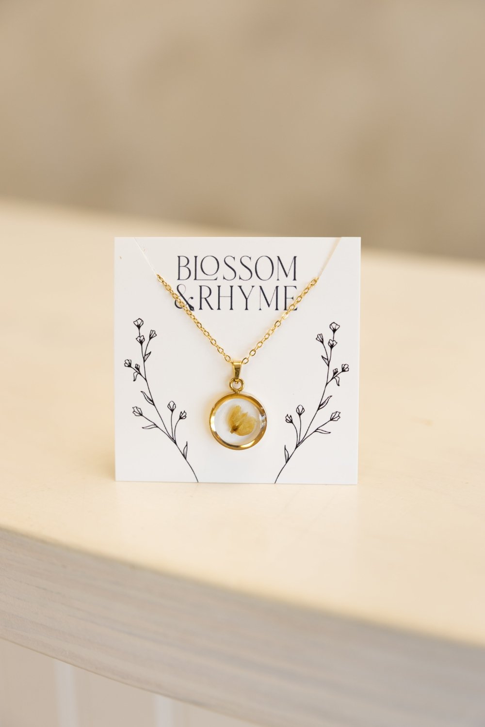 May birth month flower - lily of the valley pressed into a pendant necklace keepsake.